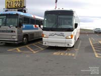 Greyhound Lines 2750 (1996 MCI MC-12 - 48-state pool 047) & 7107 (Los Angeles-based 2002 MCI G4500 - pool 554)