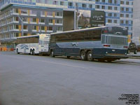 Greyhound Lines 6915 (2000 MCI 102DL3 rebuilt) and 1298