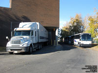 Greyhound Courier Express 8854 and GCTC 1075 (1999 MCI 102DL3)