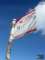 A typical OC Transpo bus stop and sign