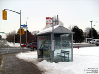 A typical OC Transpo bus stop and sign