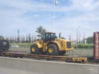 A Caterpillar machine travels CN network on TTX Company's HTTX 94204