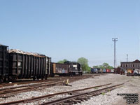 A NS train is passing Sandusky, Ohio station.
