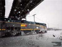 Via Rail 917 (P42DC / Genesis) arrives from Montreal during a snowstorm and crosses Allenby diamond in Quebec City,QC