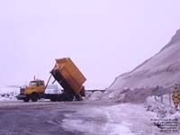 A City of Victoriaville truck is dumping used snow.