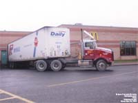 An old Transport Leblanc tractor with an old Papineau International trailer