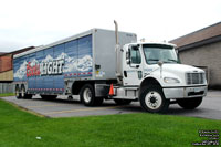 Molson Breweries tractor with a Coors Light trailer