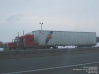 Peterbilt truck with an old Papineau trailer