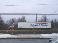 An old Transport Leblanc tractors hauls a Select-Daily P&D trailer