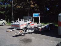 Open-top trailer and dolly